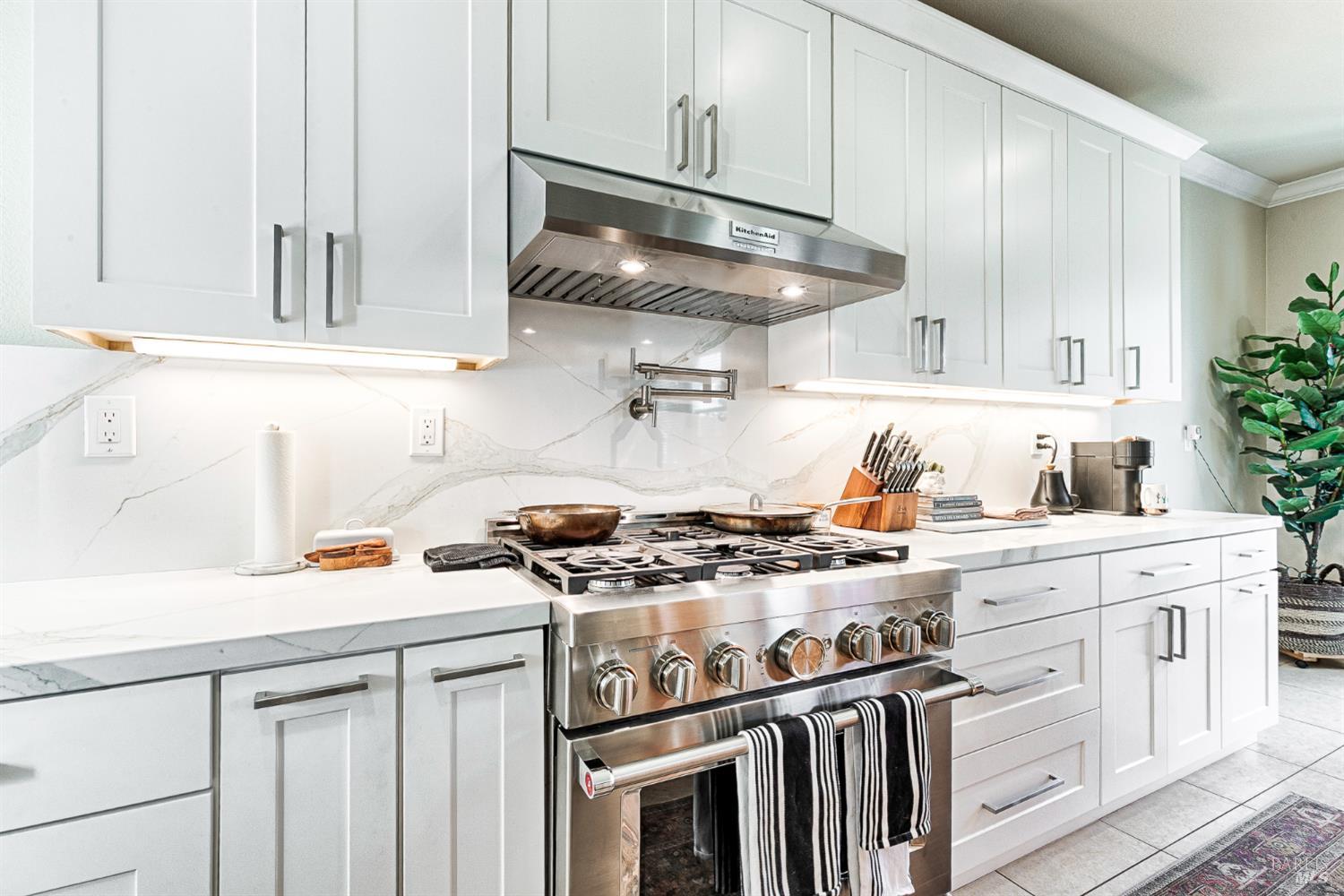 2167 Linwood Avenue Santa Rosa, CA 95404 - Photo 23 of 80 a kitchen with stainless steel appliances granite countertop a stove a sink and cabinets