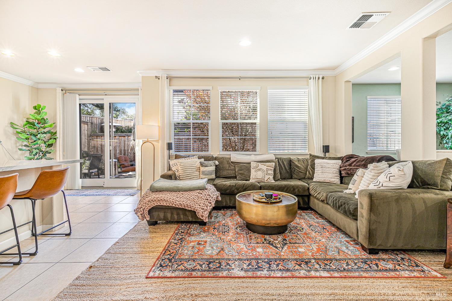 2167 Linwood Avenue Santa Rosa, CA 95404 - Photo 26 of 80 a living room with furniture a large window and a rug