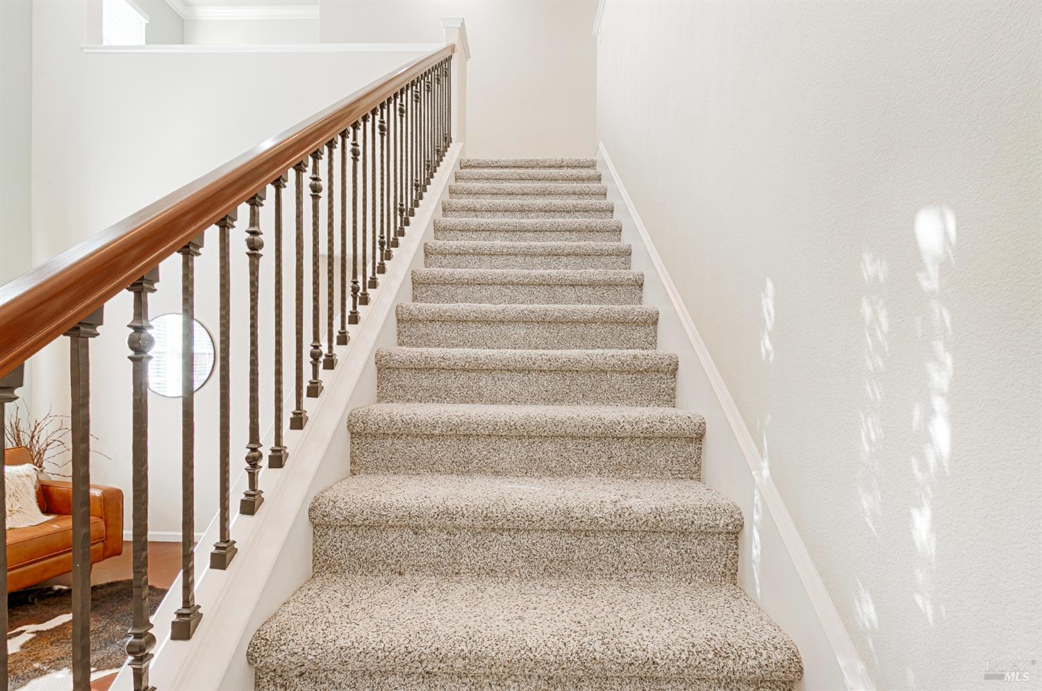 2167 Linwood Avenue Santa Rosa, CA 95404 - Photo 41 of 80 a view of staircase with lots of frames on wall