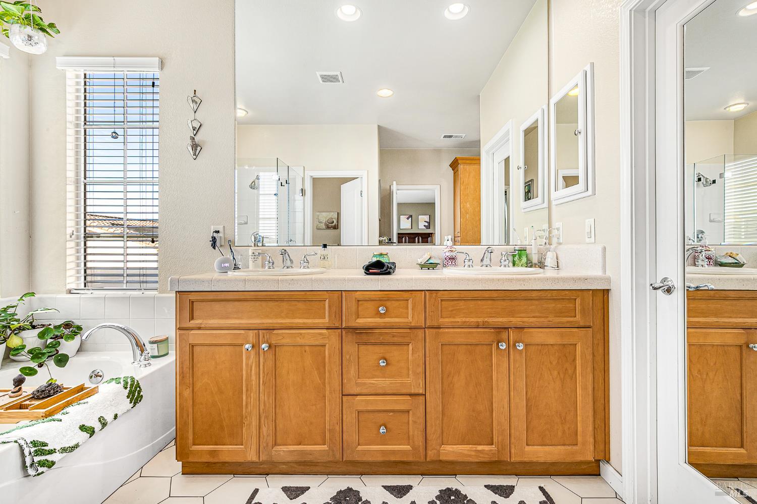 2167 Linwood Avenue Santa Rosa, CA 95404 - Photo 52 of 80 a bathroom with a sink mirror and a shower