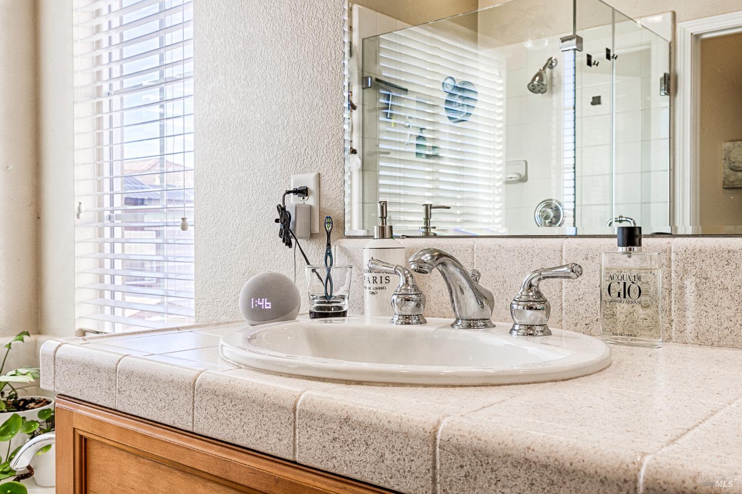 2167 Linwood Avenue Santa Rosa, CA 95404 - Photo 56 of 80 a bathroom with a double vanity sink and a mirror