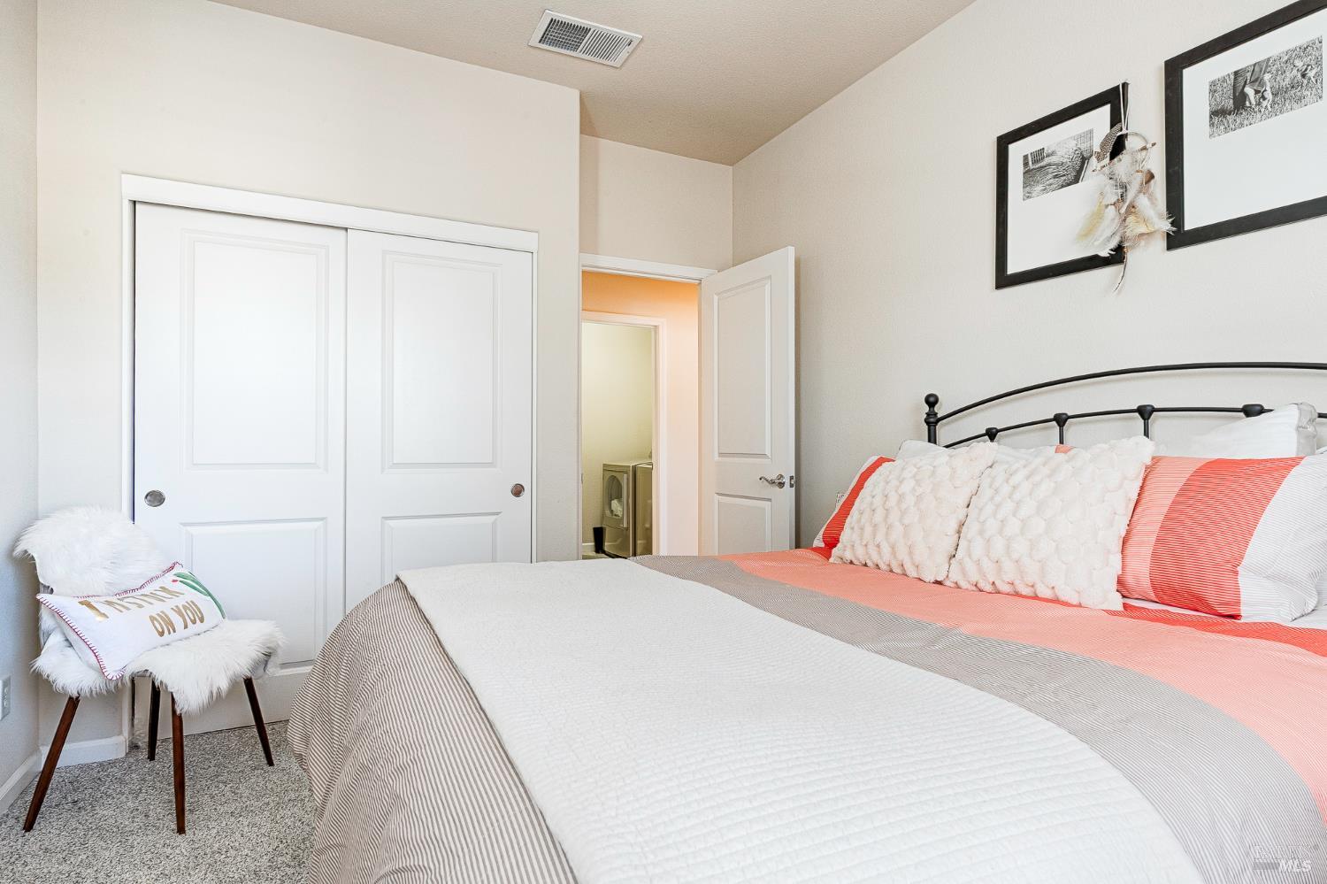 2167 Linwood Avenue Santa Rosa, CA 95404 - Photo 61 of 80 a bedroom with a bed and chair