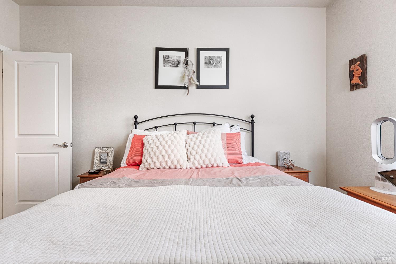 2167 Linwood Avenue Santa Rosa, CA 95404 - Photo 62 of 80 a bedroom with a bed and a painting on the wall