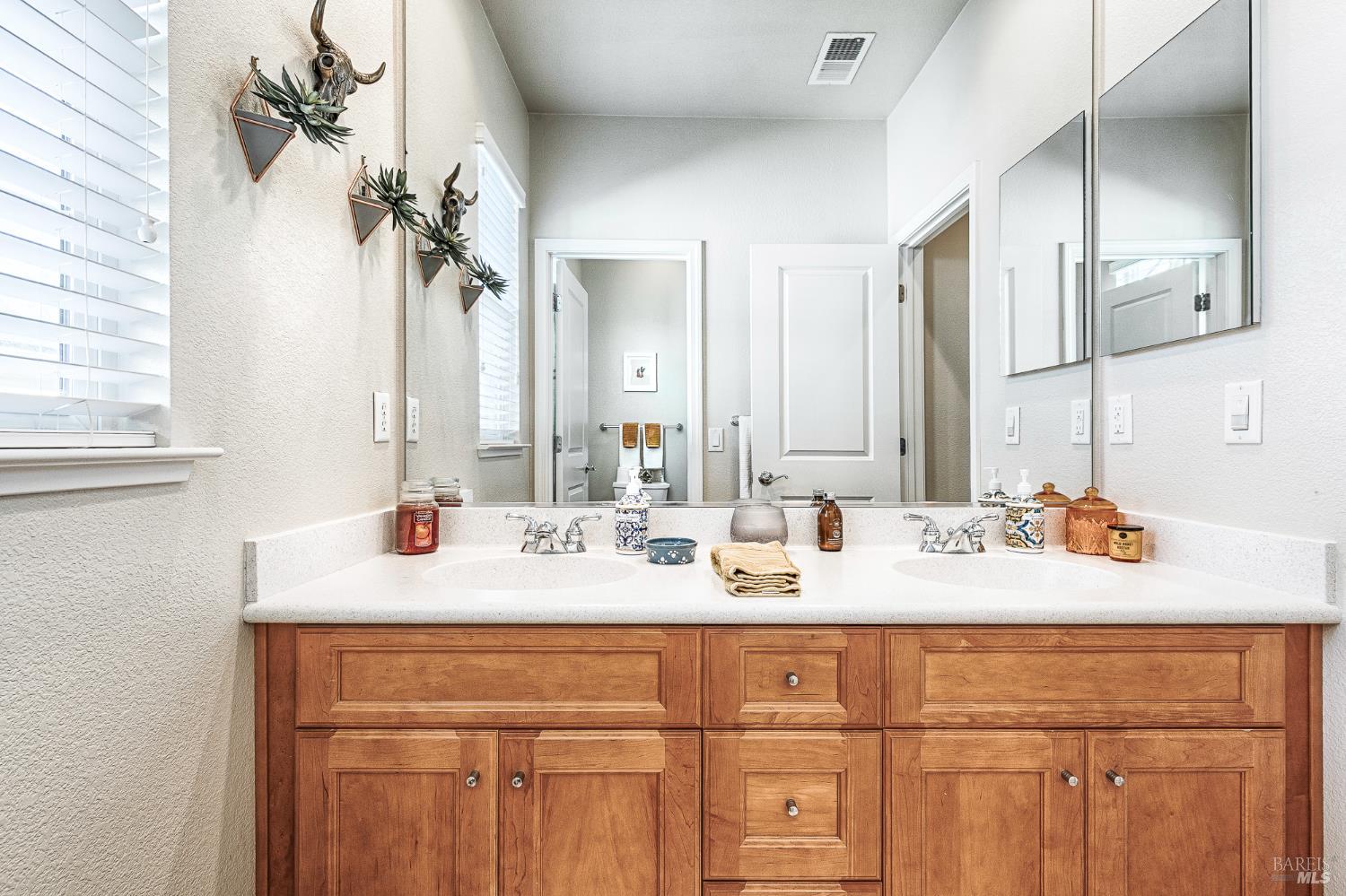 2167 Linwood Avenue Santa Rosa, CA 95404 - Photo 65 of 80 a bathroom with a sink double vanity and a mirror