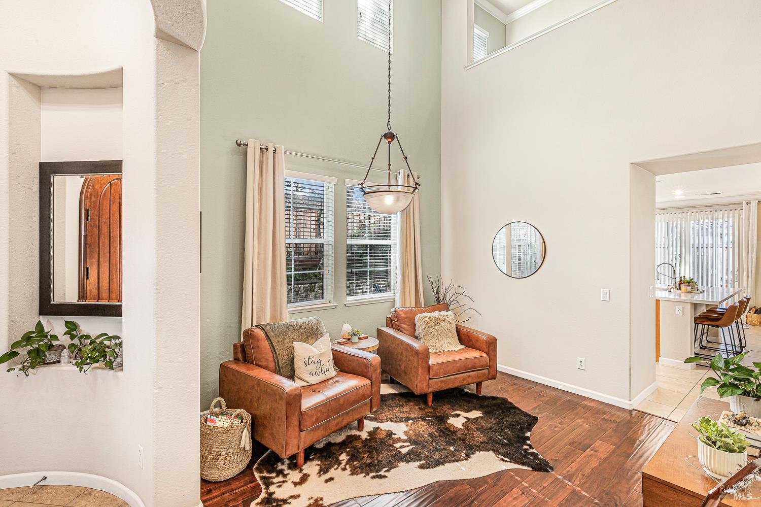 2167 Linwood Avenue Santa Rosa, CA 95404 - Photo 10 of 80 a living room with furniture a rug and a chandelier