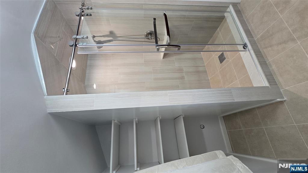 459 Summit Street Ridgewood, NJ 07450 - Photo 17 of 22 a bathroom with a shower