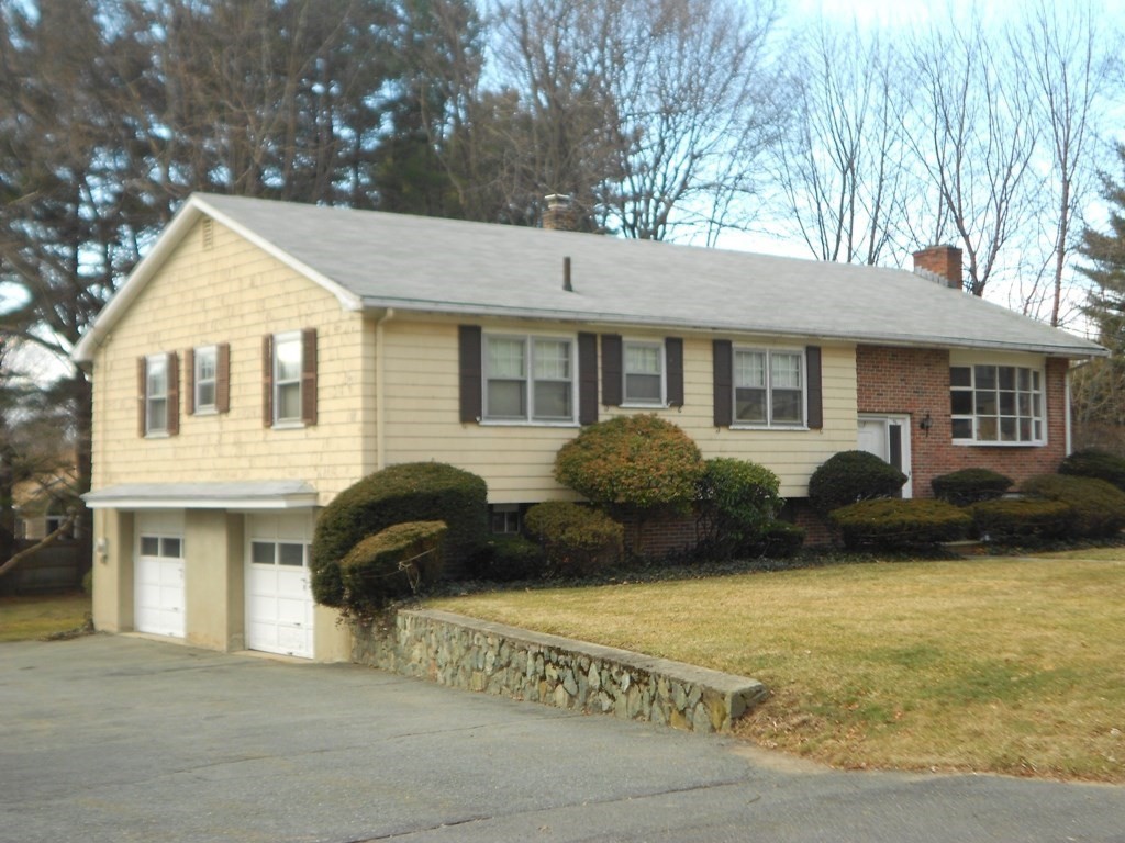 a house view with a garden space