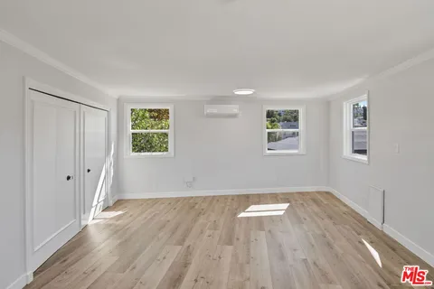 a bathroom with a sink vanity and a mirror