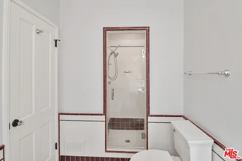 a view of a garden from a balcony