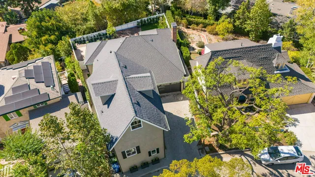 a view of hallway with wooden floor