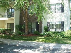 4 Huntington Circle Peekskill, NY 10566 - Photo 1 of 1 a front view of a house with garden