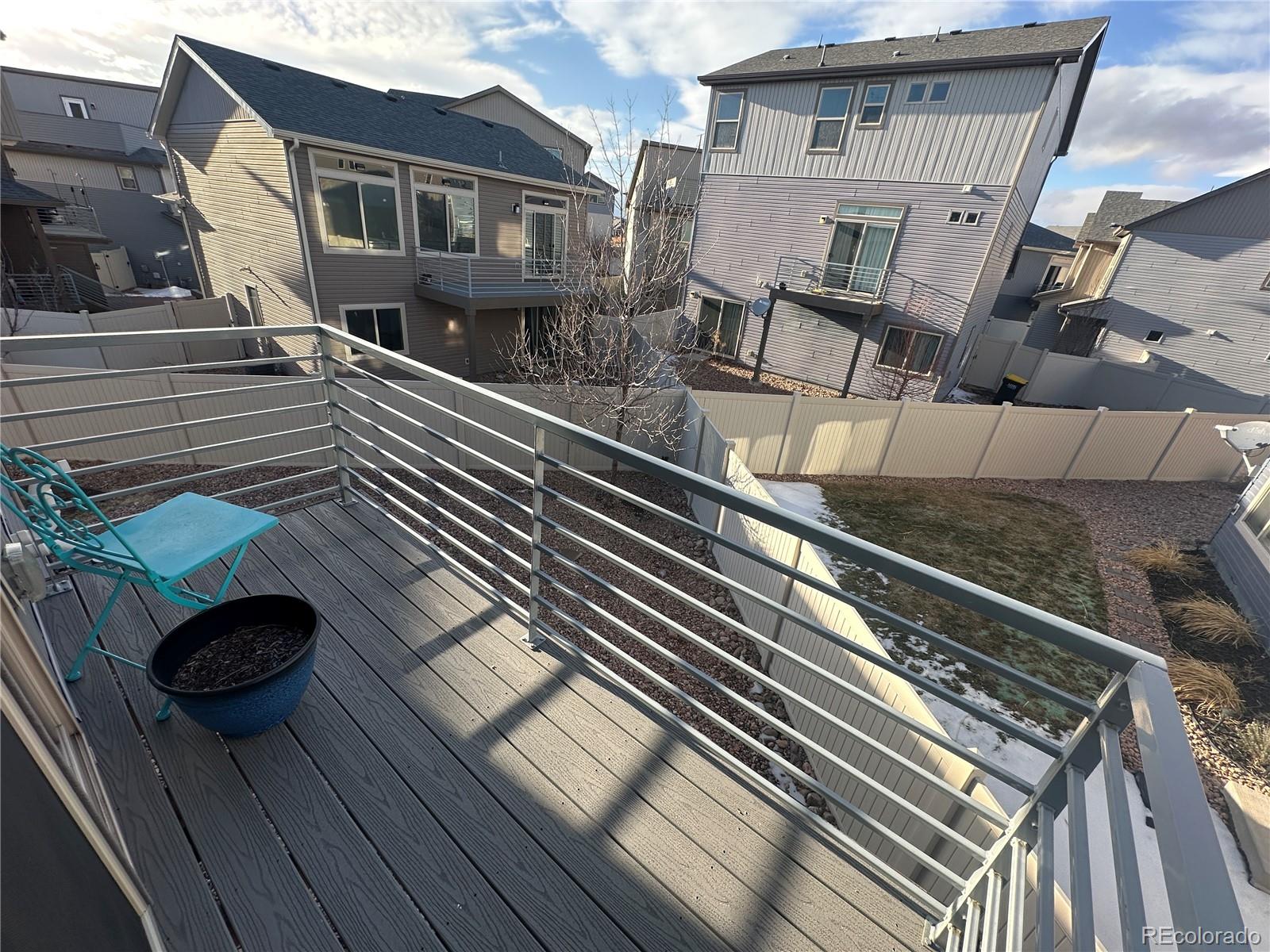 6612 Thicket Pass Lane Colorado Springs, CO 80927 - Photo 6 of 17 a view of house with a chairs