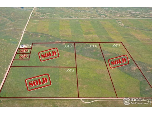 a view of a street with an ocean view