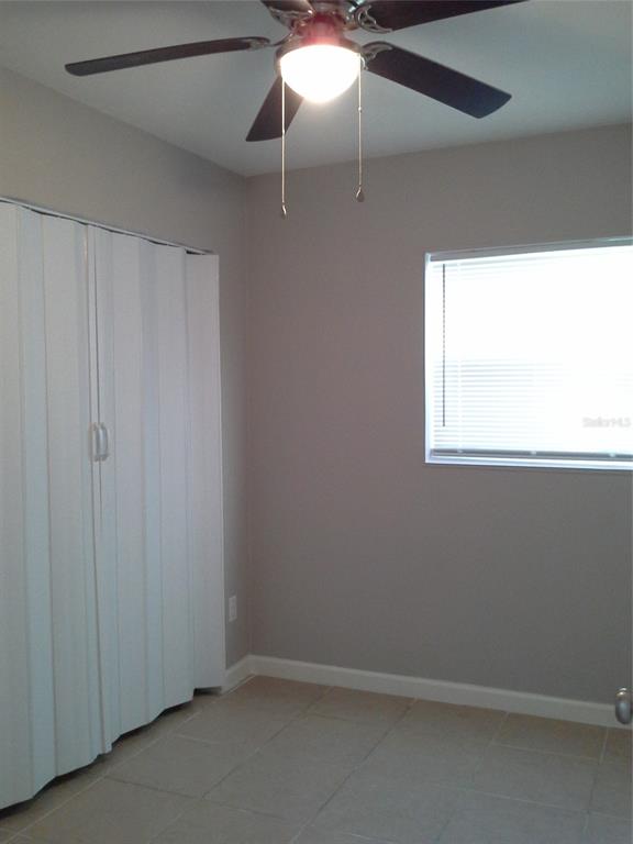 11708 Balm Riverview Road Riverview, FL 33569 - Photo 12 of 19 a view of an empty room with a window