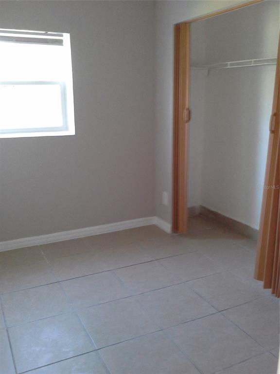 11708 Balm Riverview Road Riverview, FL 33569 - Photo 16 of 19 a view of an empty room and a window