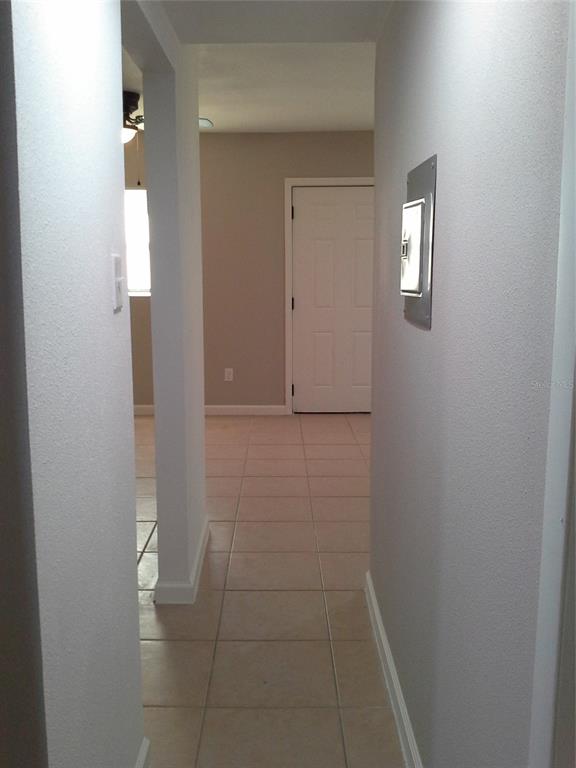 11708 Balm Riverview Road Riverview, FL 33569 - Photo 17 of 19 an empty room with mirror and bathroom
