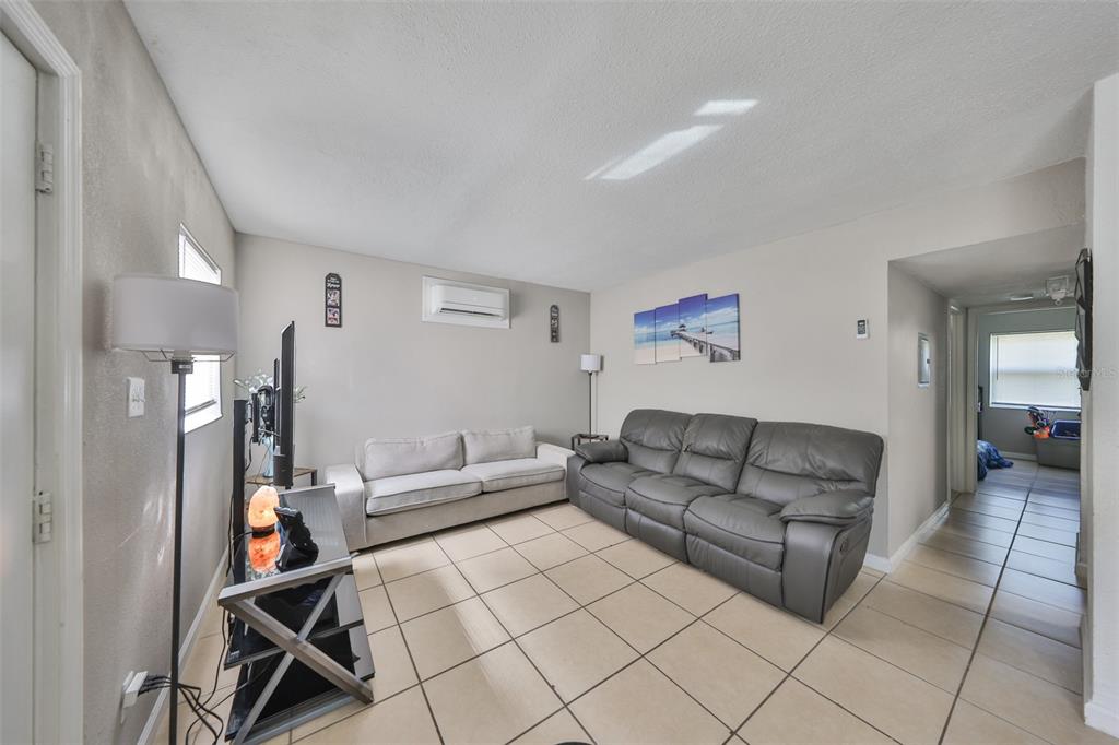 11708 Balm Riverview Road Riverview, FL 33569 - Photo 24 of 38 a living room with furniture and a couch