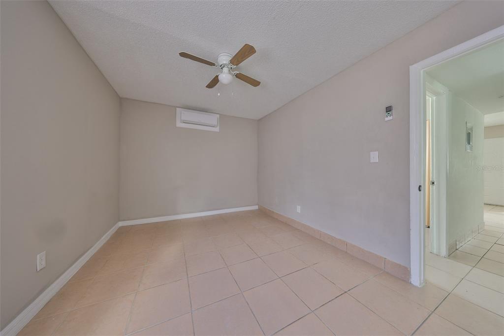 11708 Balm Riverview Road Riverview, FL 33569 - Photo 33 of 38 wooden floor in an empty room