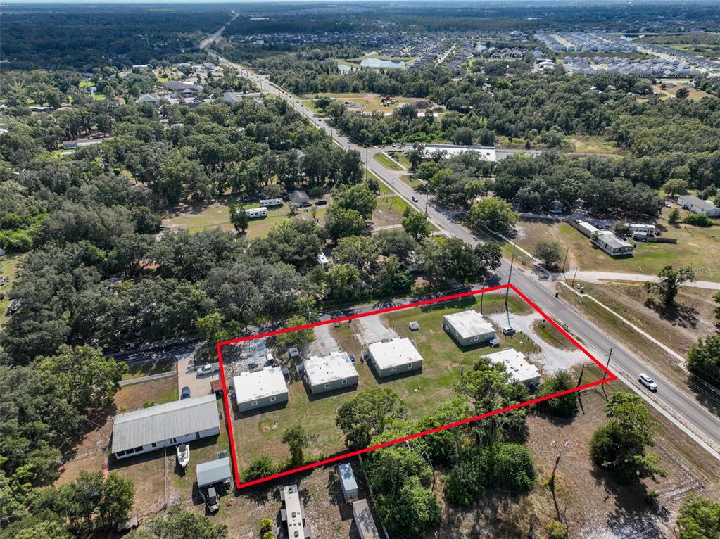 11708 Balm Riverview Road Riverview, FL 33569 - Photo 36 of 38 an aerial view of swimming pool patio and mountain view