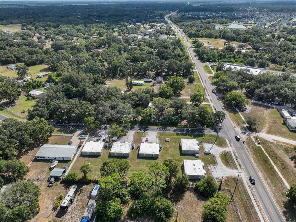11708 Balm Riverview Road Riverview, FL 33569 - Photo 37 of 38 an aerial view of residential houses with outdoor space