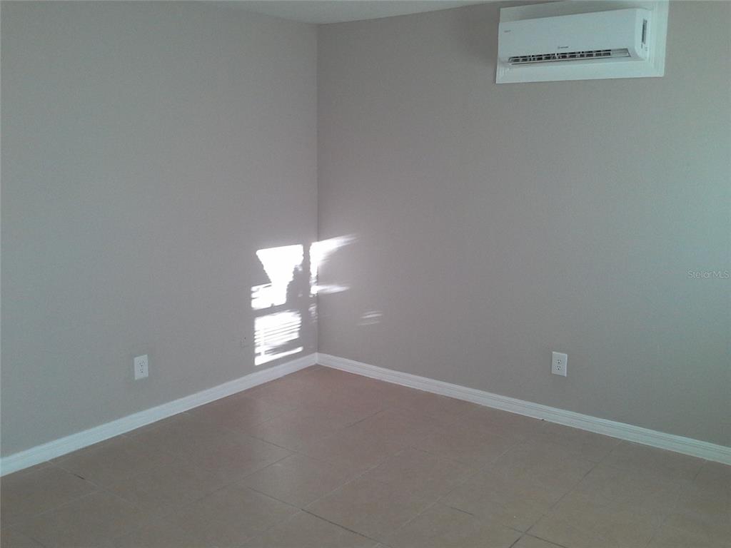 11708 Balm Riverview Road Riverview, FL 33569 - Photo 7 of 19 an empty room with a window