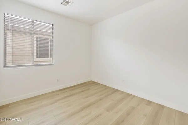 a view of a room that has a window in it