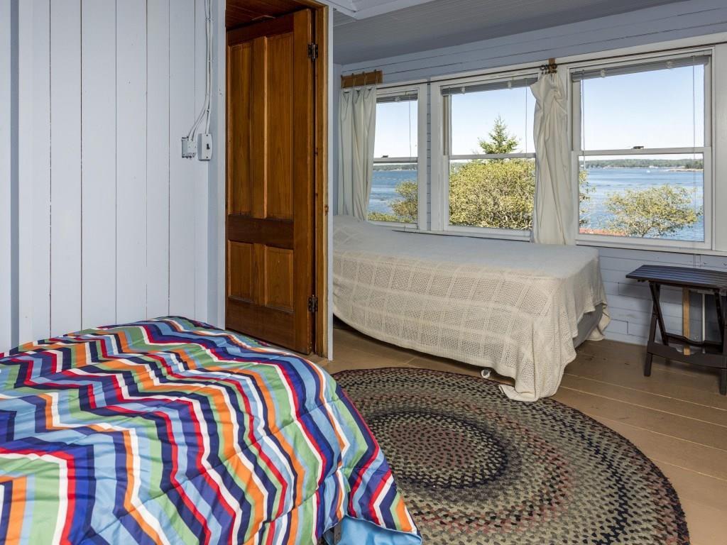 153-260 Van Horn Road East Boothbay, ME 04544 - Photo 19 of 25 Guest bedroom with with painted pine...