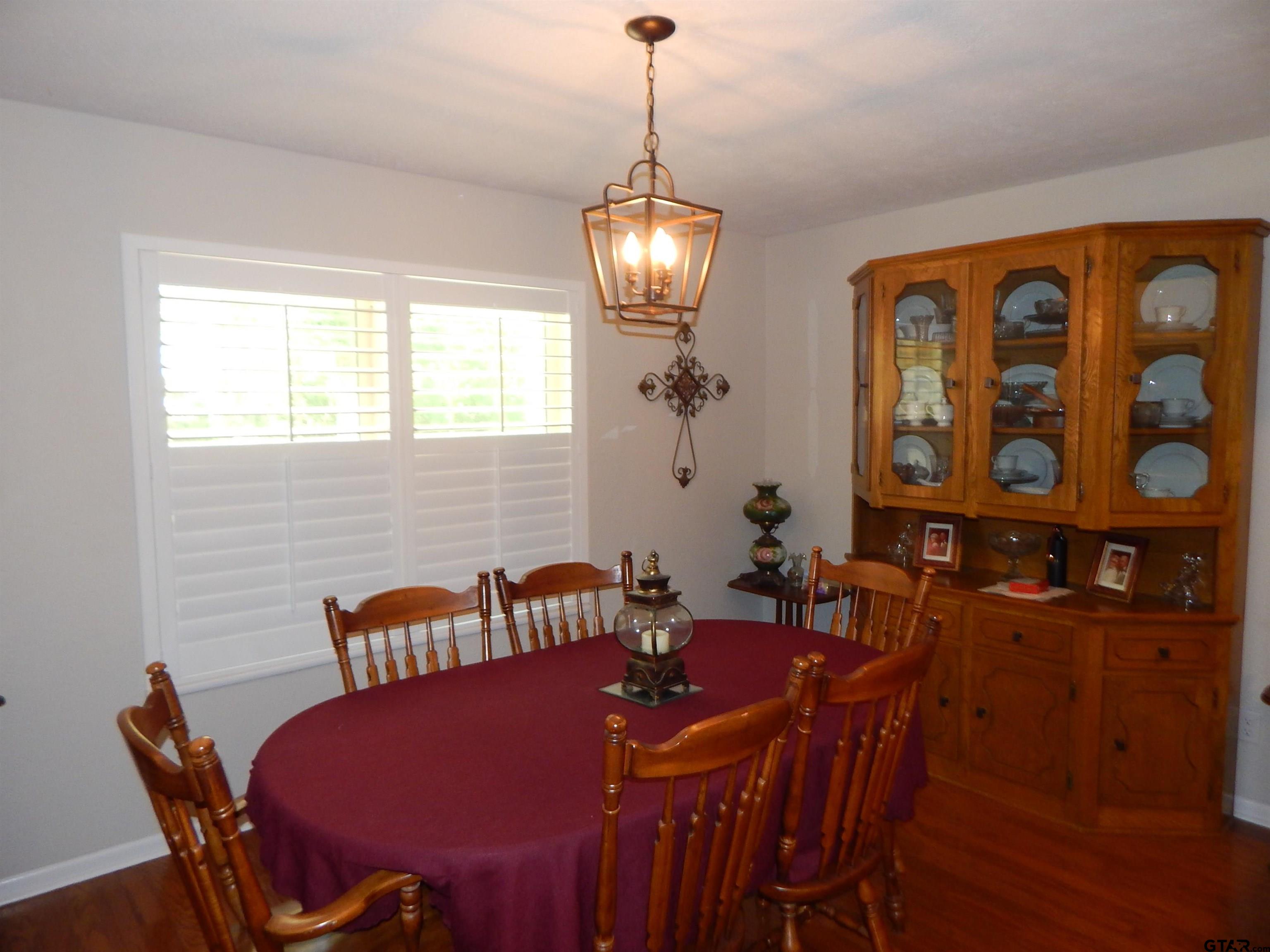 3035 Arrowwood Road Gilmer, TX 75644 - Photo 4 of 32 a view of a dining room with furniture