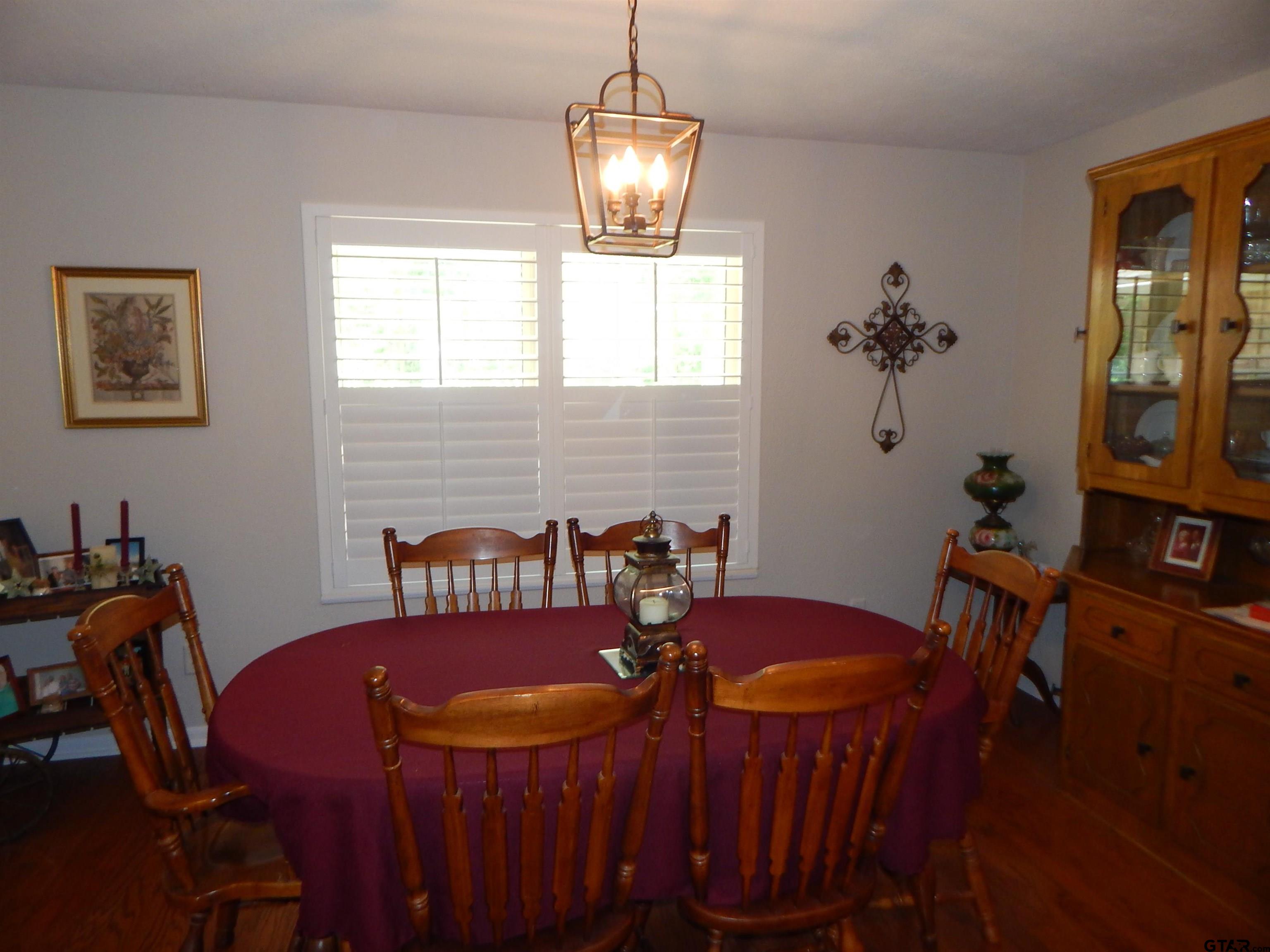 3035 Arrowwood Road Gilmer, TX 75644 - Photo 5 of 32 a view of a dining room with furniture