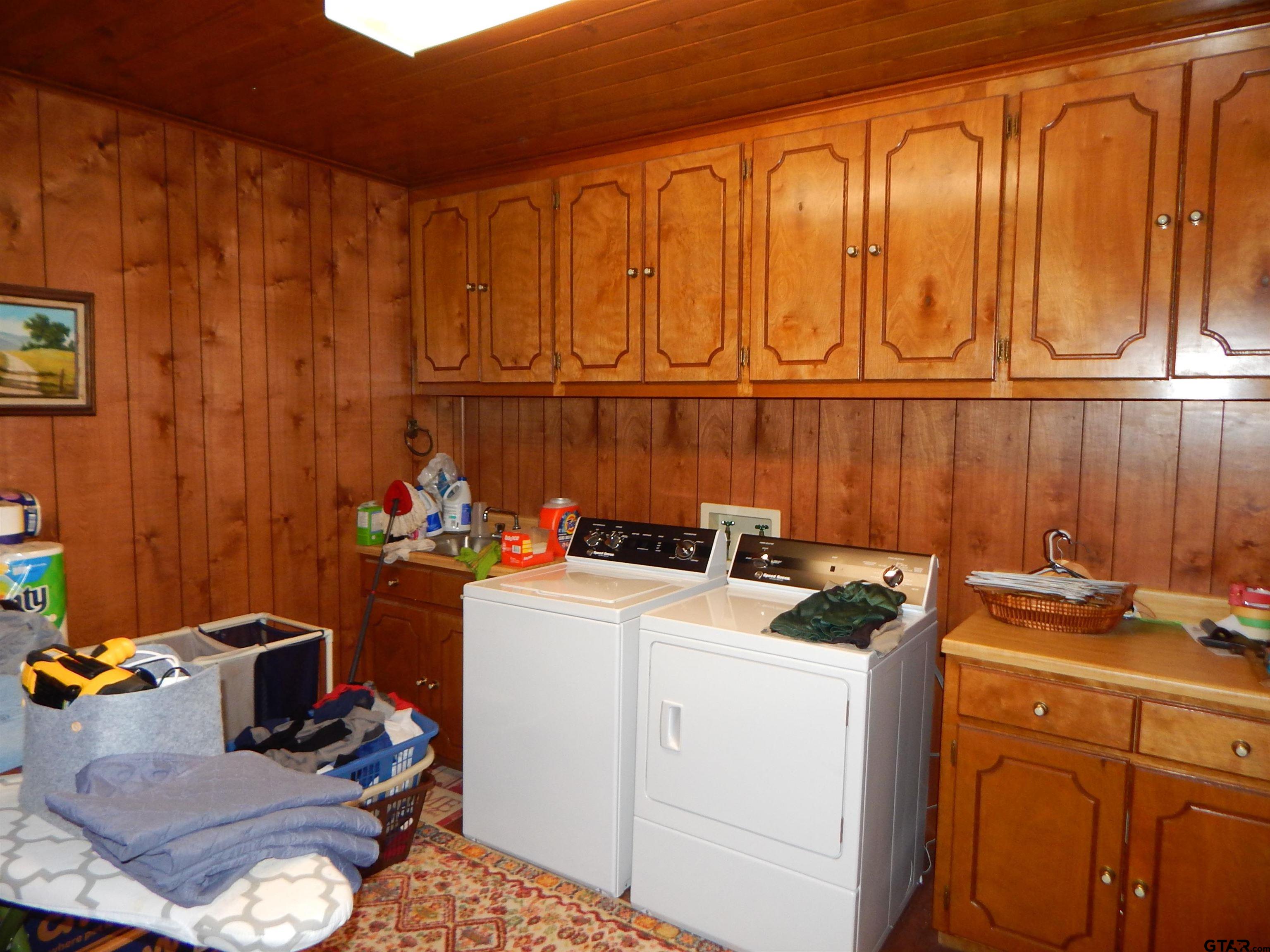 3035 Arrowwood Road Gilmer, TX 75644 - Photo 8 of 32 a room with storage and utility