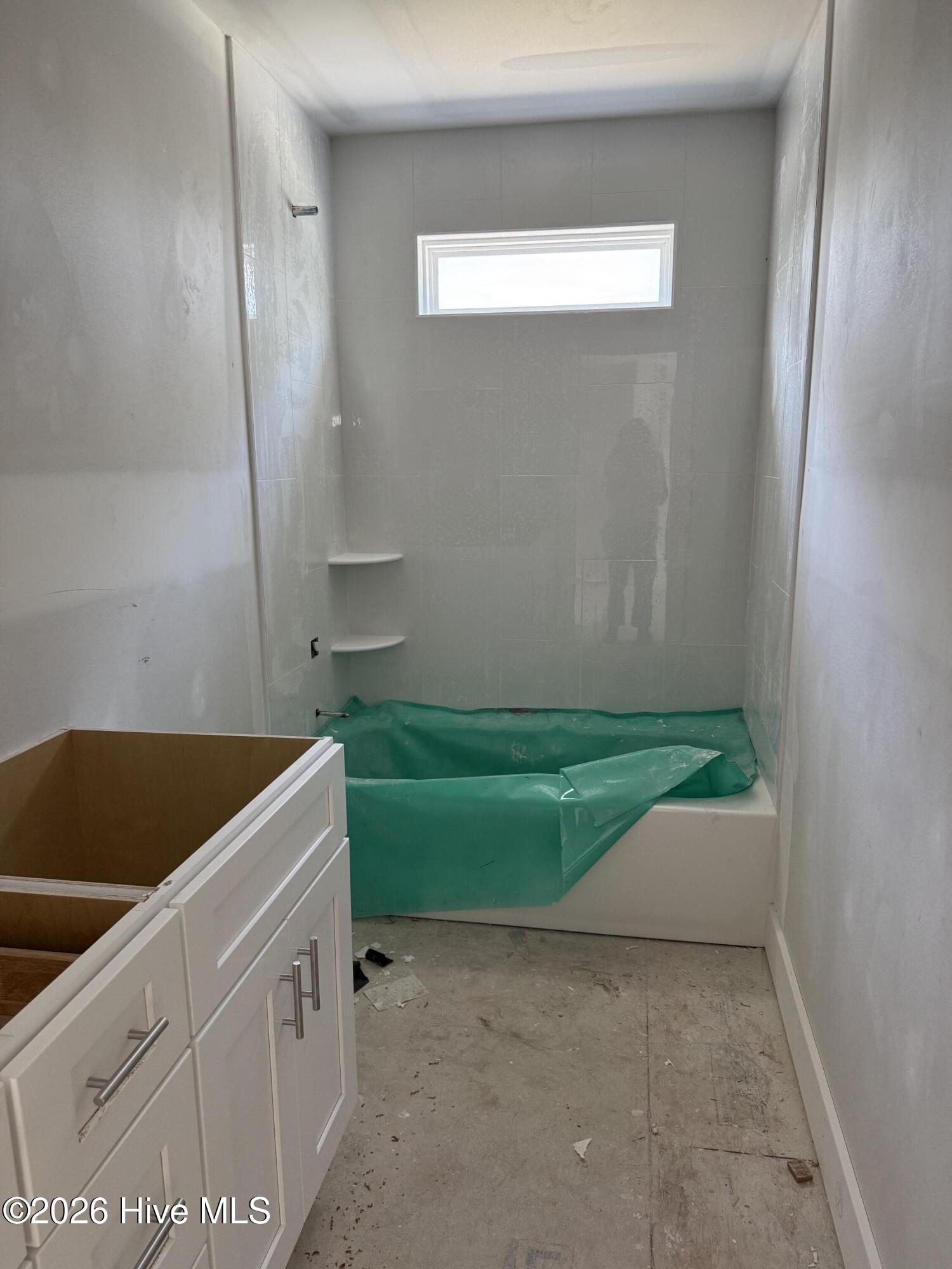 175 Twining Rose Lane Holly Ridge, NC 28445 - Photo 22 of 27 Shared bath between two bedrooms upstairs. Last bedroom has its own bathroom.