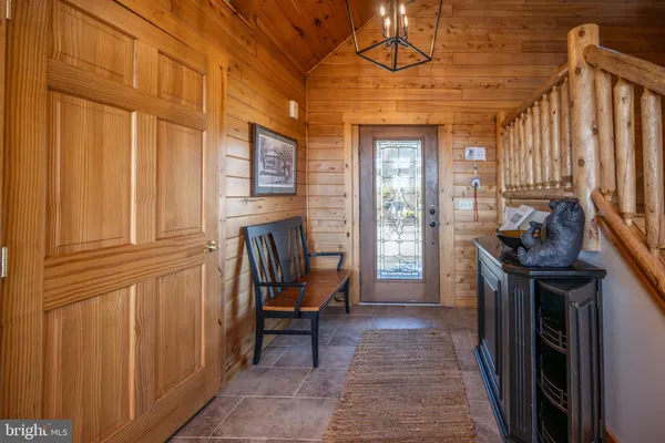 a bathroom with bathtub and a shower