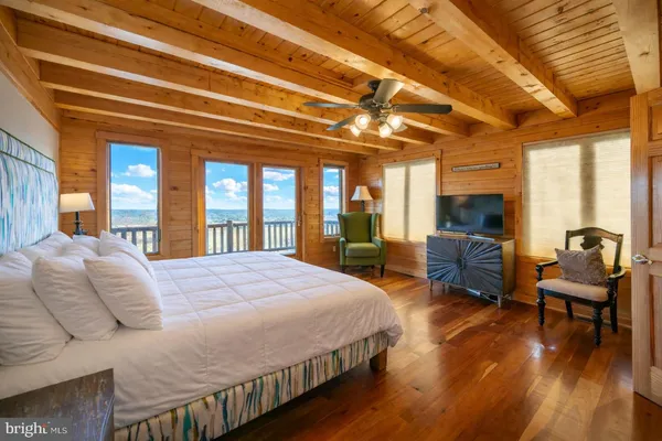 a bathroom with a tub and shower