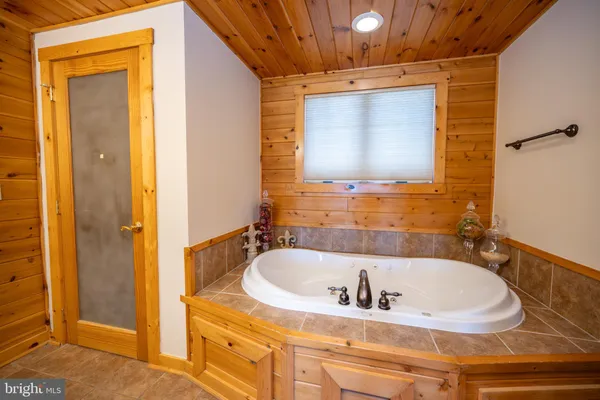 a view of a balcony with wooden floor