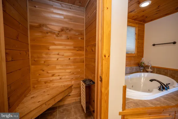 a view of a table and chairs in a room