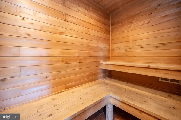 a view of a two chairs in the balcony