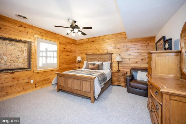 a view of garage with a table and chairs