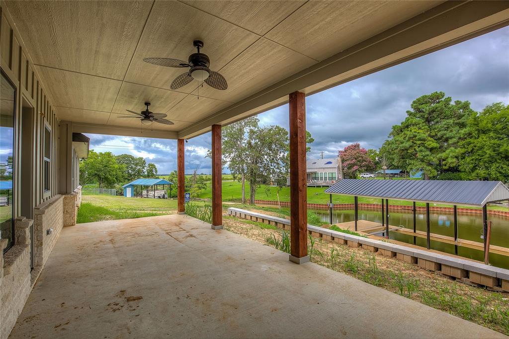405 Door Key Ranch Road Trinidad, TX 75163 - Photo 26 of 28 View of patio with a water view and ceiling fan