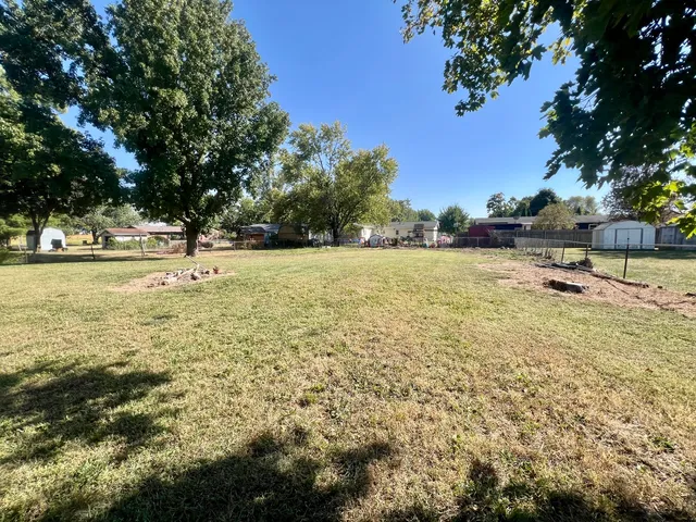 a view of an outdoor space and swimming pool