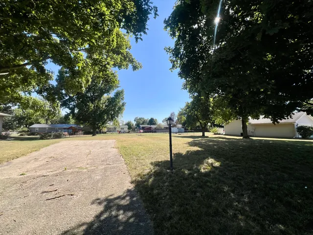 a view of a lake with trees