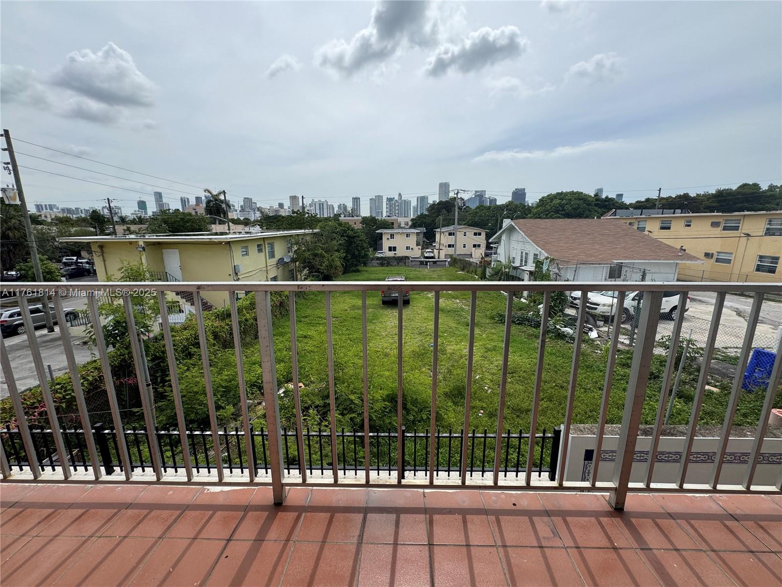 1126 Southwest 3rd Street, Unit 3 Miami, FL 33130 - Photo 5 of 9 a view of a balcony with city view