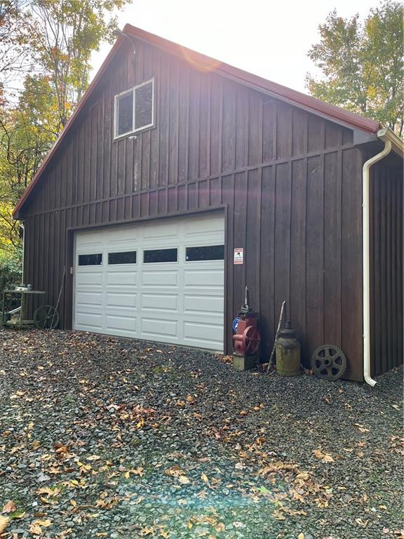 319 Farm Road New Bethlehem, PA 16242 - Photo 4 of 12 a backyard of a house with chairs and wooden fence