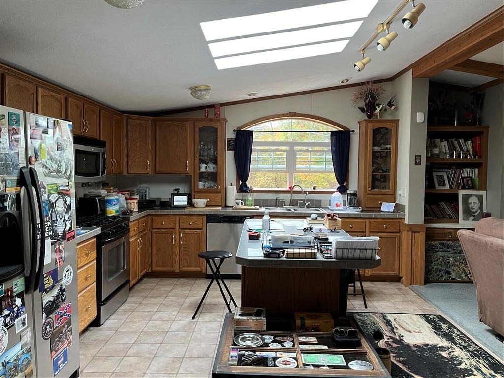 319 Farm Road New Bethlehem, PA 16242 - Photo 9 of 12 a kitchen with a sink appliances and cabinets