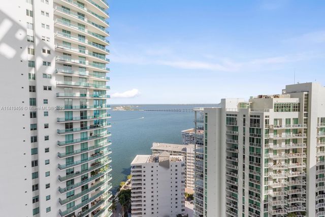 a view of a city with tall buildings