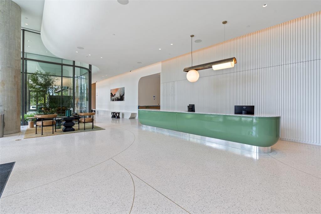 44 East Avenue, Unit 4402 Austin, TX 78701 - Photo 11 of 39 a view of a livingroom with furniture and floor to ceiling window