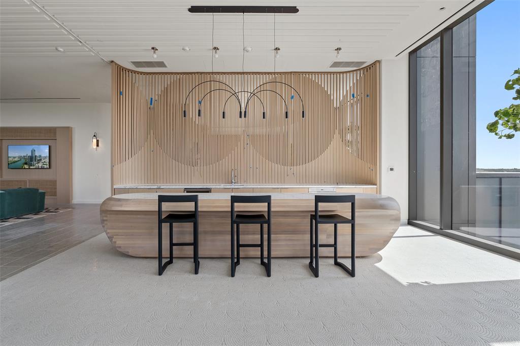 44 East Avenue, Unit 4402 Austin, TX 78701 - Photo 17 of 39 a view of an chairs and table in a room