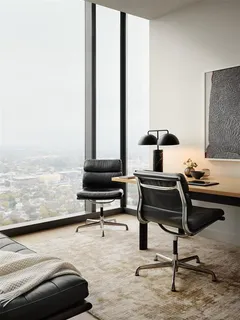 a room with a table and a flat screen tv