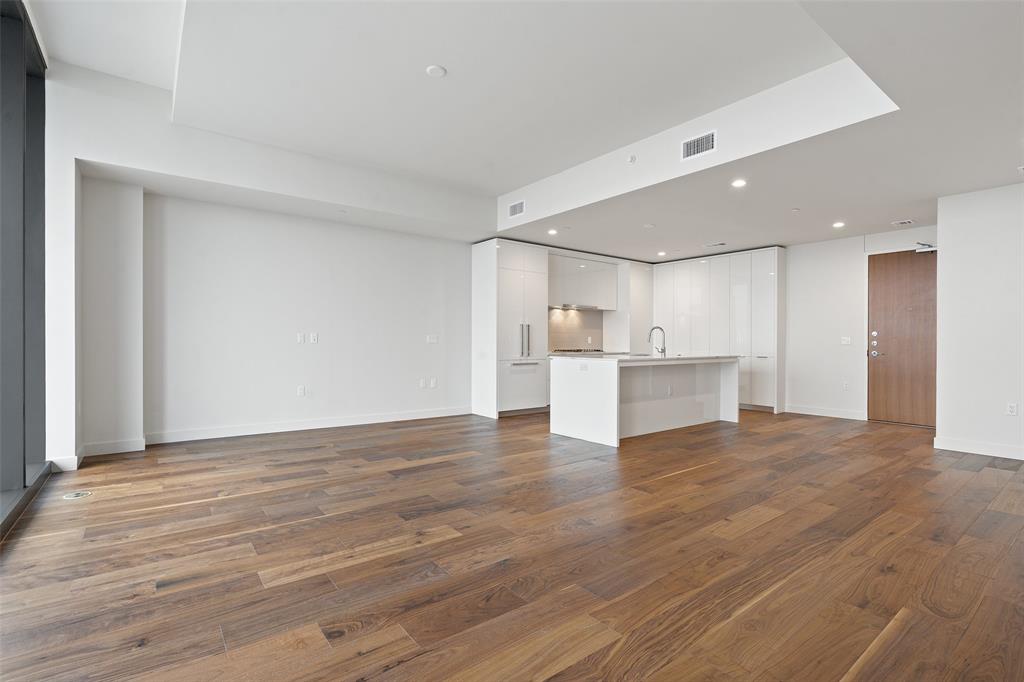 44 East Avenue, Unit 4402 Austin, TX 78701 - Photo 35 of 39 a view of empty room with wooden floor