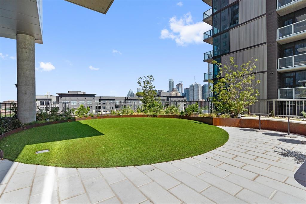 44 East Avenue, Unit 4402 Austin, TX 78701 - Photo 10 of 39 a view of a swimming pool with a fountain