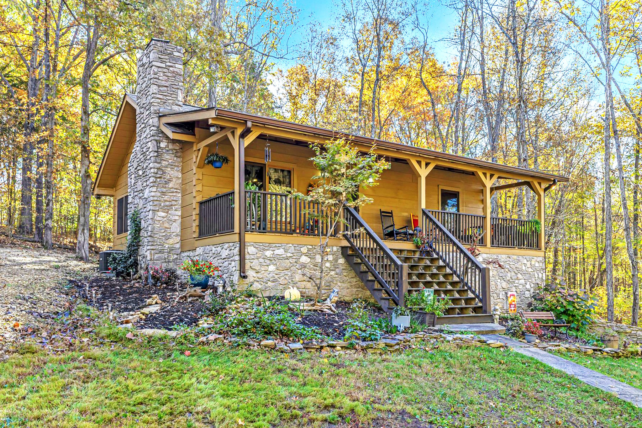 a front view of a house with garden
